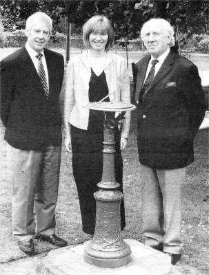 Kenneth Brown, School Governor, Elizabeth Dickson, Principal and James Davidson, member of Lisburn Preparative Meeting of The Society of Friends, beside the sundial at Friends' School, which was recently restored.