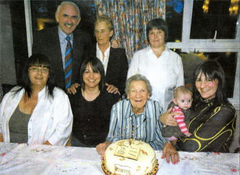 100-year-old Margaret Major with family and in particular young Katie Connor to her left who is 100 years younger! US4107409PM Pic by Paul Mur