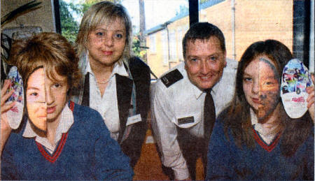 Rhianna Kay and Holly Campbell with Polish police Captain Goska Barska and PSNI officer Samuel Campbell at Hunterhouse College where she gave a talk on Race Hate Crime US4107-508C0