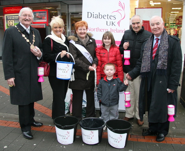 Pictured during a street collection in Bow Street, Lisburn last Monday 22nd December which raised ï¿½907 for the Mayorï¿½s chosen charity Diabetes UK are L to R: Lisburn Mayor Councillor Ronnie Crawford, Dromore Councillor Carol Black, Beverley Matherson, Victoria Black, Jim Emery, Alderman Ivan Davis OBE and Jordan Nunleavey (front). 11-year-old Victoria has had Diabetes since she was 9 months old and Jordan, whose mother was most keen to support the collection, has been Type 1 insulin dependent for the past year.