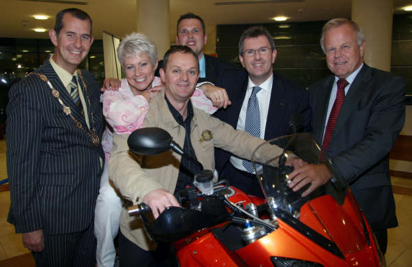 Pamela Ballantine (UTV) and Phillip McCallen (Road Racing Legend) pictured at the Lisburn Road Safety Evening at Lagan Valley Island, Lisburn last Thursday (18th September) with L to R: Alderman Edwin Poots MLA (Deputy Mayor), Councillor Andrew Ewing (Lisburn Road Safety Vice Chairman), Lagan Valley MP Jeffrey Donaldson and Councillor Trevor Lunn MLA (Lisburn Road Safety Chairman).