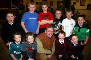 Members of Lisburn Temperance Junior LOL 100 pictured with David McCallion (War Yearï¿½s Remembered) at the WW1 Exhibition in Lisburn Orange Hall.