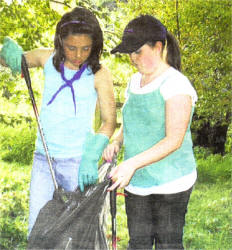 Members of 2nd Lambeg Scout Group take part in the clear up.