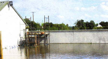 The flooding outside his home on the Derrynahone Road, Maze.