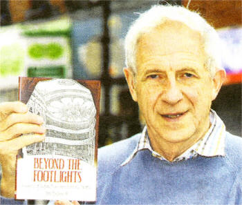 Jim McDowell with a copy his book 'Beyond the Footlights'