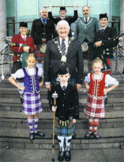 Pictured at the launch of the event are (l-r front row) Amy Gray, Highland Dancer, Emma Barr, Drum Major and current European title holder, Holly McMullan, Highland Dancer, (second Row) Mayor Ronnie Crawford, (third row) Mariad Wilson, Piper