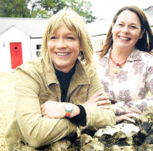 The proprietor of Kilwarlin Cottages Gayle Kilpatrick with Rural Development Minister Michelle Gildernew.