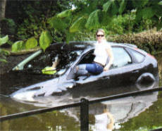 A woman is stranded in car at the Gallops housing development, Lisburn.