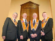 Pictured against the backdrop of a plaque showing past masters of Whitehill LOL 258 are L to R: Most Worshipful Robert Saulters (Grand Master), Br Will MacRoberts (Worshipful Master), Br Bertie MacRoberts (Past Master) and Br Drew Nelson (Secretary - Grand Orange Lodge, Ireland).