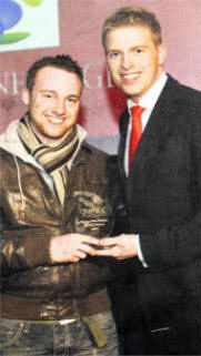 Andrew Tohill receiving the award for Recollection which won Best Film in the 18-25 year old category of the Cinemagic Young Filmmaker Competition in association with BT Vision.