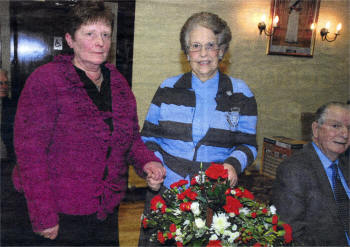 Audrey Fletcher presenting flowers to Baroness Paisley