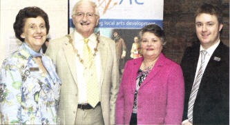Winifred Bell, left, and Richard Yarr, right, from Lisburn Arts Advisory Committee, welcoming Mayor Ronnie Crawford and his wife to the harp recital at Lisburn Museum. US4608-505cd