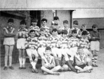 Taken in April 1967 this photo shows Hilden School's 5-A-Side and 11-A-Side. Back Row: Francis Crossey, Stephen Capps, Thomas Hooks, Desmond McCallion, Martin McAfee, Peter Smith, James Hamilton, Pat McCaugherty, Teirnan Burns. Middle Row: Terence Hawthorne, Brian Chambers, Paul Drayne, Trevor Kirkwood, Leonard Nelson, Jim Walsh. Front Row: Philip King and Tom King (twins).