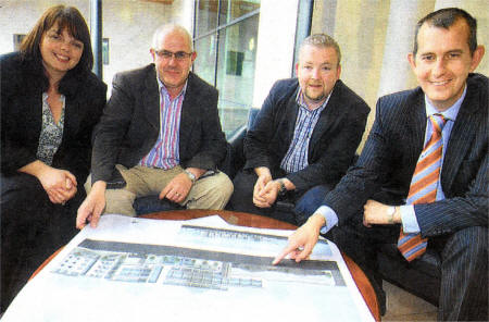 Patricia Elliott Lisburn City Management, Joe Tumelty of Ebony Developments, Ciaran Deazley of Gregory Architects and MLA Edwin Poots Chairman of Lisburn City Centre Management look at plans for Lisburn's first city centre hotel. US2308-138A0