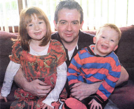 Jonny Stevenson back home with his children Sophie and Luke after reaching the finals of Masterchef. US1008-528C0