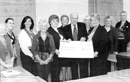 NI Leukaemia Research Fund Lisburn Branch committee members presenting a cheque for �20,000 to Professor Terry Lappin. Group includes Mrs Gretta Clarke and Mrs Lovina Russell. US1008-352DW