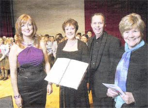 At the recent 'Mary' Christmas event at the Island Centre are one of the Leading Ladies Lynne McAllister, conductor Bobby Wright, Pond Park Primary's Acting Principal and pianist Geoffrey Cherry and Joan McCloy, Chairman of the Mary Peters Trust.