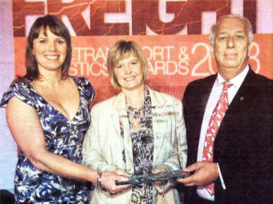 Carol Thompson of McCulla Ireland receives the award from Graham Eames of Thermo King and Nuala McKeever.