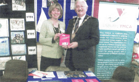 Lisburn Mayor Councillor Ronnie Crawford attended a Family Morning organised by Lisburn Parents' Forum recently, where members of Connor Diocese Mothers' Union discussed their Parenting Project.