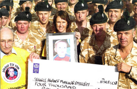 Sergeant Gary Wilkins and the men of 2 Royal Irish IMJIN Company with Gillian Garrett (S.A.M. Chairperson), Sam Letters (S.A.M. Committee Member).