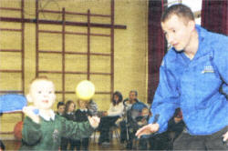 Kevin Madden, sports development officer with Lisburn Council, enjoying a ball game with Luca Mullholland. US4308-523cd