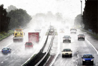 Motorway misery - heavy rain, spray and poor visibility made driving difficult on the MI. on Tuesday morning.
