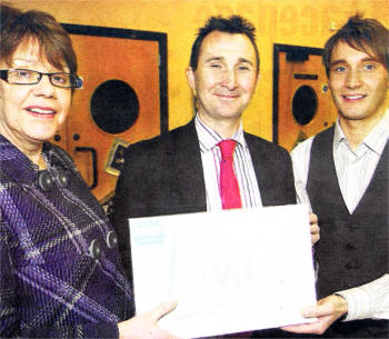 Parkview Principal Muriel Martin, Rodney Agnew of Antrim Construction and Parkview teacher Phillip Reain pictured as Antrim Construction present Parkview school with a Wii Sports for naming the Hallstein Hall estate on the Brokerstown Road. USS108-108A0