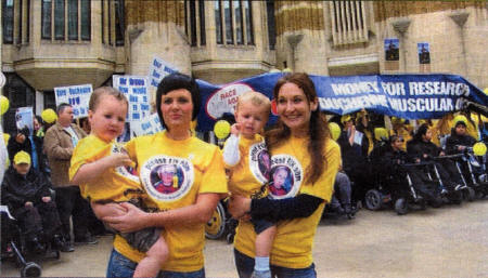 Julie with Carter and Tracy with Sam outside Parliament.