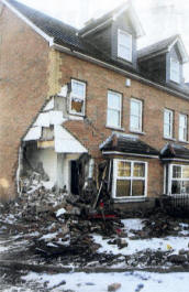 Extensive structural damage is clearly visable to the front of the house.