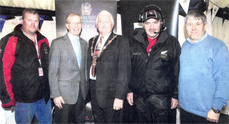 Pictured at the Ulster Grand Prix before it was called off due to torrential rain, were (1-11 Eric Oliver , Chairman of Dundrod and District Motorcycle Club, Gregory Campbell, Minister for Culture, Arts and Leisure, Mayor of Lisburn, Councillor Ronnie Crawford, Noel Johnston, Clerk of the Course, and Councillor Brian Heading, Chairman of the Leisure Services.