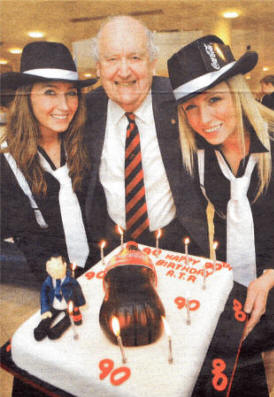 Mr Robinson celebrating his 90th birthday with Coca-Cola events team members Judi Wilson and Beverley Crockard.