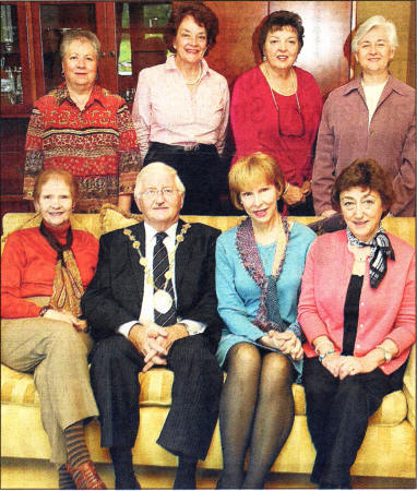 The group of friends celebrated their 20th reunion with a special visit to the Mayor's Parlour recently. From left to right are: Back row: Ruth Anderson, Rachel Bowling, Judith Lamonde and Peggy Bridges. Front row: Sarah L. Gainey, Lisburn Mayor, Councillor Ronnie Crawford, Franta Broulik and Lorna Sawyer. US3908- 127A0