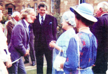 Mr. McCarthy greets the Queen Mother during a garden party at Hilsborough.