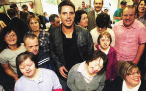 Keith Duffy of Boyzone pictured with clients at Lisburn Adult Resource Centre. US3709106A0 Picture By: Aidan O'Reilly