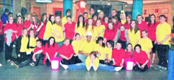 The Children in Need dancers were still smiling after dancing the routine eight times at four different venues. Pic by Stacey Irvine.