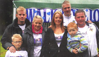 At the 'Walk for Josh' held in Hillsborough Forest Park are Richard Ogle, Dylan Ogle, Emma McMinn, Elaine Maginnis, Taylor Baxter and Gareth Baxter. Also included is Linfield footballer William Murphy who went along to support the event.