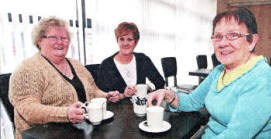 Eileen O'Neill, Maura Lowery and Peggy Agnew enjoying a cup of tea at St Patrick's parish centre. U54609-511cd