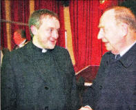 The Rev Edward McGee and Councillor Peter O'Hagan enjoying a chat