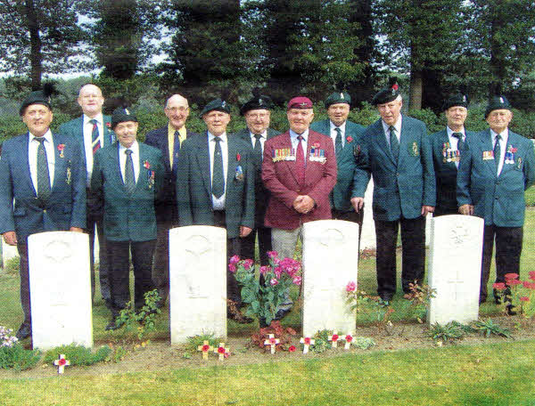 Members of the Lisburn Royal Ulster Rifles Association at Arnhem Commonwealth War Graves Commission Cemetery.