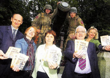 Gregg Hall and Neal Armstrong from the Wartime Living History Association , Alan Clarke Lisburn City Centre Management, Louise Smith of Island Arts Centre, Councillor Jenny Palmer, Lisburn Mayor Allan Ewart and Anthea McWilliams, Chair of the Richard Wallace Trust, launching the Lisburn Historic Quarter Festival. US36O9-1O9AO Picture By: Aidan O'Reilly