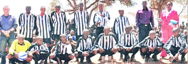Kumpa Holy Mothers Primary School in the Wesley FC kit.