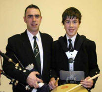 14-year old Dean Bingham, of Waringsford Pipe Band who played a drum solo at a Burns Nightis pictured with his father Ivor, Pipe Major of the band.