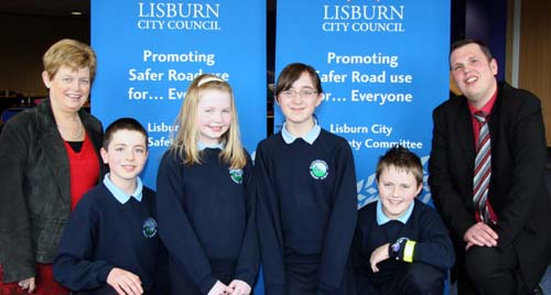 The second prize-winning team from Ballycarrickmaddy Primary School L to R: Thomas Storey, Erin Loughran, Susan Rutter and Nathan Kelly. (back row) Mrs Ann Thompson (Principal) and Andrew Ewing (LRSC Vice Chairman).