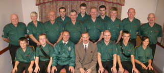 Gary Shields (Conductor) and Lisburn Young Defenders Flute Band pictured after performing at the Pre-Demonstration Dinner.