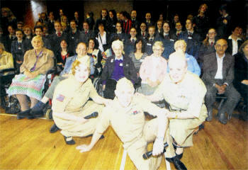 Pat Morris, Brian and Barbara Walker of Dance Unlimited pictured with pupils of Hunter House College and Residents of Kingsway Nursing Home during a second world war concert at the School.
