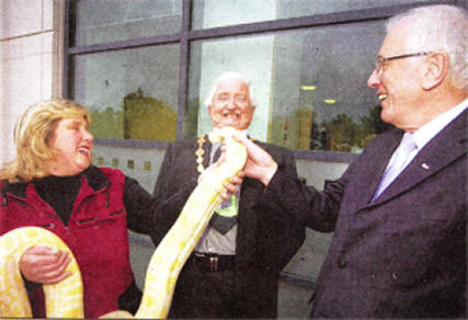 `Great Snakes!' - Mayor Ronnie Crawford with Allan Ewart (Chairman of the Economic Development Committee) and Elaine McCreery of C&J's Rare Breeds Farm at the launch of the National Country Sports Fair at the Civic Centre US1909-401PM
