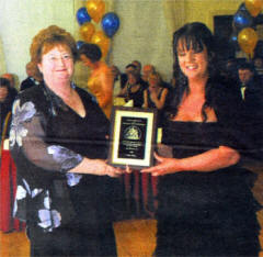 Cathy Pielou (left) receives her award from Dr. Val McGarrell at the recent Royal College of GPs 7th Annual Gala Awards Evening.