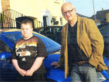 Roger Gillespie and his son Chris had their car clamped after parking it outside Lisburn City Library. US1509.350dw 