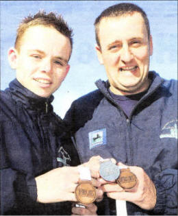 Conor Patton who won two Bronze Medals and a Silver Medal in the Tranplant Games in Sheffield pictured with his father John Patton. US4408-107A0 Picture By: Aidan O'Reilly