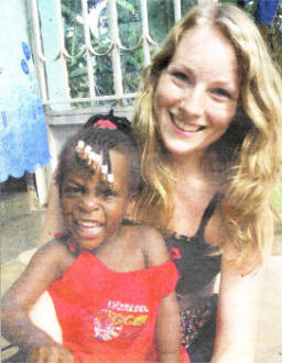 Becky with a little girl from Gulu.